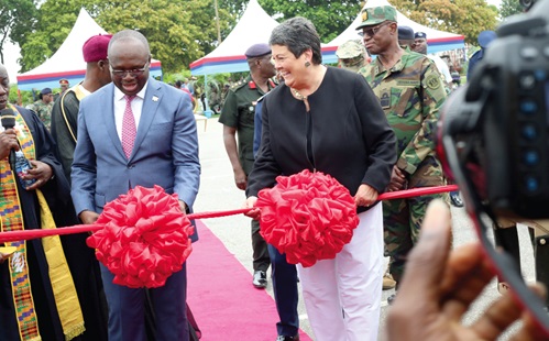 Dr Edward Omane Boamah (left), Minister of Defence, cutting a ribbon at the handing over ceremony at the Burma Camp. With him is Virginia Palmer (right), US Ambassador to Ghana, and some senior officers. INSET: The armoured vehicles that were donated to the Ghana Armed Forces. Picture: BENEDICT OBUOBI Dr Edward Omane Boamah (left), Minister of Defence, cutting a ribbon at the handing over ceremony at the Burma Camp. With him is Virginia Palmer (right), US Ambassador to Ghana, and some senior officers. INSET: The armoured vehicles that were donated to the Ghana Armed Forces. Picture: BENEDICT OBUOBI