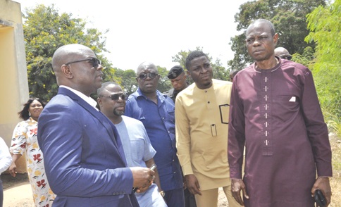Benjamin Yawo Dei Headmaster of Mawuli School, interacting with some of the visiting MPs, while Francis Agbemadi (3rd from right), the Volta Regional Director of Education, looks on Benjamin Yawo Dei Headmaster of Mawuli School, interacting with some of the visiting MPs, while Francis Agbemadi (3rd from right), the Volta Regional Director of Education, looks on
