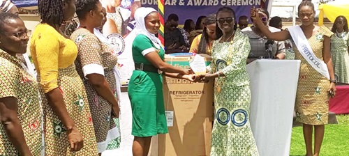 Ayisha Dakurah receiving her award as the best midwife in the Upper West region Ayisha Dakurah receiving her award as the best midwife in the Upper West region