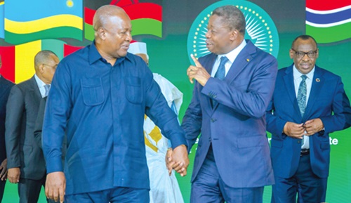 President John Mahama (left) interacting with President Faure Gnassingbé of Togo President John Mahama (left) interacting with President Faure Gnassingbé of Togo
