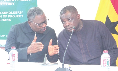 David Nwedu (left), Communication and Visibility Consultant for the Abidjan-Lagos Highway project, in tête-à-tête with Kwame Governs Agbodza, Minister of Roads and Highways. Picture: ERNEST KODZI