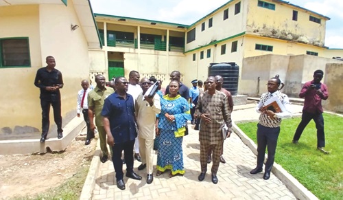 Diana Mintah (middle), Headmistress of the Ghana Senior High School, explaining some of the challenges facing the school to members of the Parliamentary Select Committee on Education