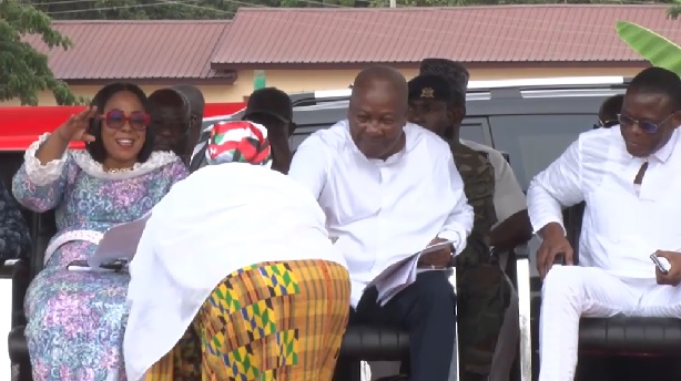 President John Mahama (middle) handing the money to the dancer. With him are Mrs Linda Akweley Ocloo, Greater Accra Regional Minister and Fifi Kwettey, NDC General Secretary President John Mahama (middle) handing the money to the dancer. With him are Mrs Linda Akweley Ocloo, Greater Accra Regional Minister and Fifi Kwettey, NDC General Secretary