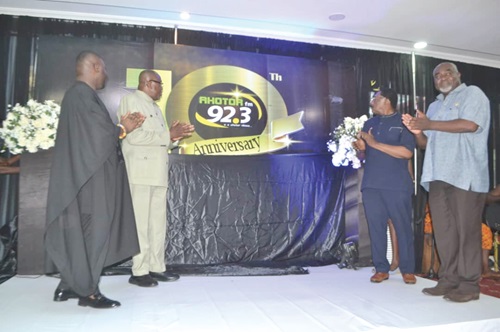 From left: Gabriel Atokple Kwamigah Tanko, member, Council of State; Dr Samuel Ofosu-Ampofo, Founder and Chief Executive of Universal Multimedia, operators of Ahotor 92.3 FM; Kofi Nyantakyi, Board Chairman, Universal Multimedia, and Paarock Van Percy, former Director-General, National Communications Authority, after unveiling the logo