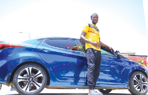 Benjamin Asare was presented a car gift for his dedication and hardwork Benjamin Asare was presented a car gift for his dedication and hardwork