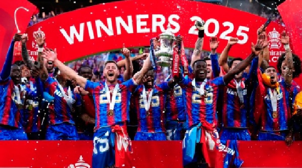 Players of Crystal Palace celebrating with the FA Cup trophy Players of Crystal Palace celebrating with the FA Cup trophy