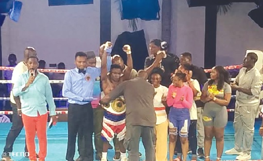 Emmanuel Mankatah Sackey being decorated with the belt after his victory Emmanuel Mankatah Sackey being decorated with the belt after his victory