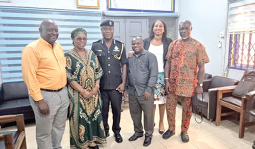Benjamin Afuny (left), Patron, Clare Banoeng-Yakubo (2nd from left), Chairperson of the association, and Reginald Solomon Osei (3rd from left), Commander of the Nima Divisional Police Command, with other members of the association