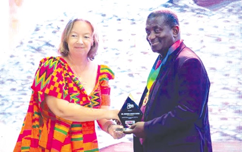 Dr Oheneba Owusu Danso, former CEO of KATH, receiving the citation from Dr Leslie Casely Hayford, a development consultant