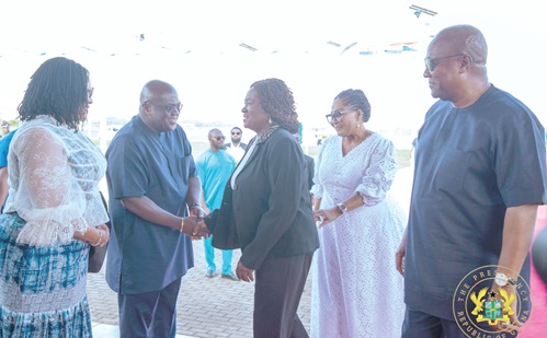 Julius Debrah (left), Chief of Staff, welcoming the Vice-President back home while President Mahama (right) looks on