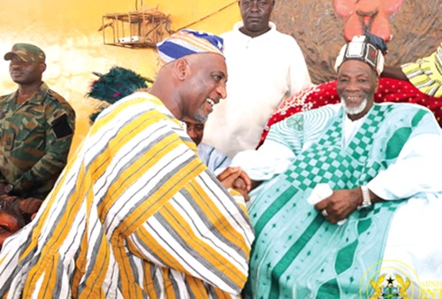 Mohammed Muntaka Mubarak (left), Minister for  the Interior, exchanging pleasantries with the Ya-Na