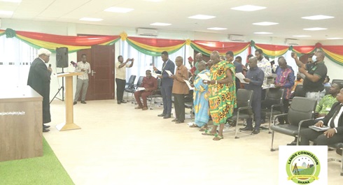 Members of the Western-North Regional Lands Commission Board being sworn into office 