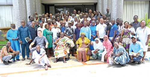 Dr Frank Huber (seated left), MD, GHACEM; Ehunabobrim Prah Agyensaim VI (seated middle), Chairman, GHACEM foundation, and Prof. Audrey Gadzekpo (seated right), council member, GHACEM foundation, with representatives of beneficiary institutions