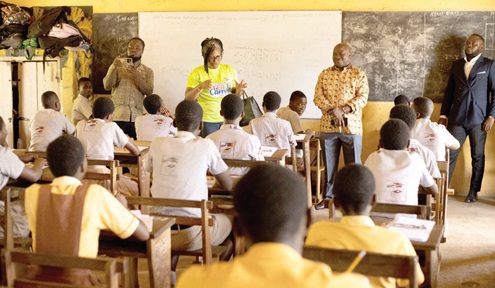 Alexander Akwasi Acquah (right) and Gloria Agyiri Kelson (middle) monitoring some of the students taking part in the mock examination
