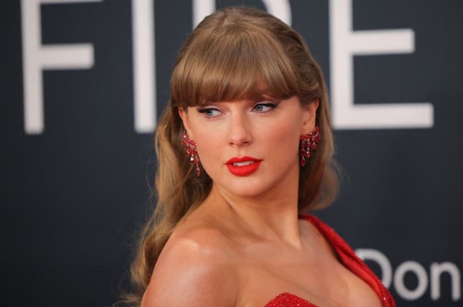 Taylor Swift poses at the red carpet during the 67th Annual Grammy Awards in Los Angeles, California, U.S., February 2, 2025. REUTERS/Daniel Cole/File Photo Taylor Swift poses at the red carpet during the 67th Annual Grammy Awards in Los Angeles, California, U.S., February 2, 2025. REUTERS/Daniel Cole/File Photo