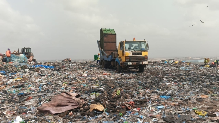 A waste disposal truck emptying a truck at the peak of the mountainous dumpsite. Pix By Benjamin Xornam Glover