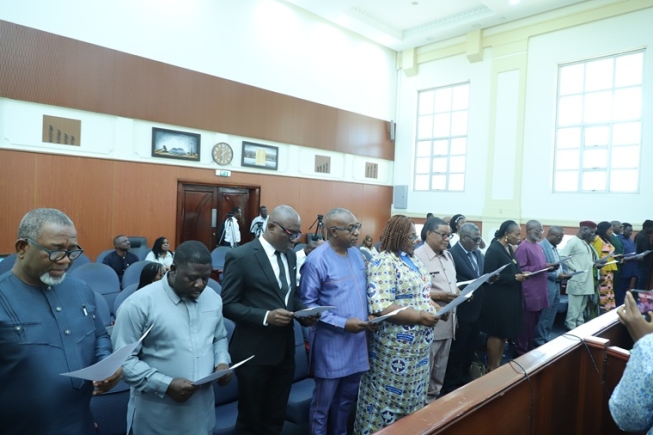 Justice Noble Jerome Nkrumah (inset), Court of Appeal Judge, swearing in members of the National Media Commission. Picture: EDNA SALVO KOTEY