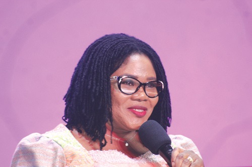 Dr Agnes Naa Momo Lartey (inset), Minister of Gender, Children and Social Protection, addressing a section of students seated at the event. Picture: ESTHER ADJORKOR ADJEI Dr Agnes Naa Momo Lartey (inset), Minister of Gender, Children and Social Protection, addressing a section of students seated at the event. Picture: ESTHER ADJORKOR ADJEI