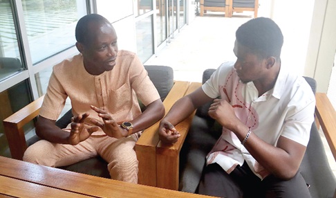 Israel Yao Dzantor (left), the Chief Executive Officer of Encyclopaedia Ghanatta, explaining a point to Dickson Worlanyo Dotse, a Daily Graphic Reporter Israel Yao Dzantor (left), the Chief Executive Officer of Encyclopaedia Ghanatta, explaining a point to Dickson Worlanyo Dotse, a Daily Graphic Reporter