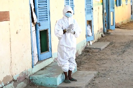 • A health worker wearing a protective outfit at a hospital where cholera patients are treated in Sudan • A health worker wearing a protective outfit at a hospital where cholera patients are treated in Sudan