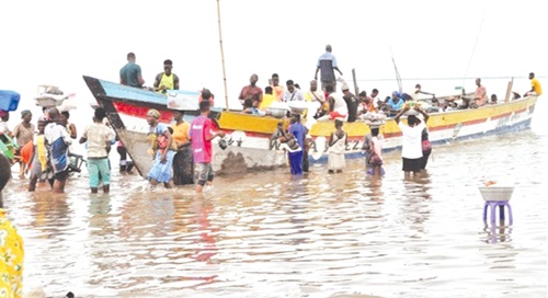 Travellers on a boat crossing the Volta Lake Travellers on a boat crossing the Volta Lake