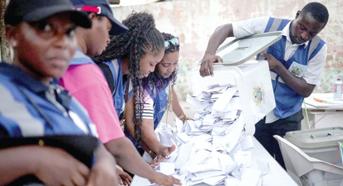 Electoral officials preparing to count presidential votes after an election