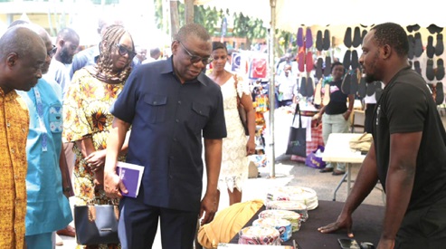  Hudu Mogtari, Chairperson of the GSA Board, inspecting products at the World Standards Day commemoration