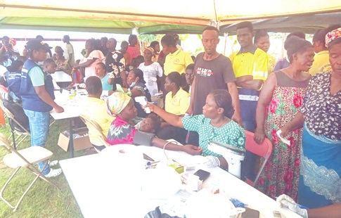 Some residents of the Sanso community being attended to by health workers during the free screening exercise