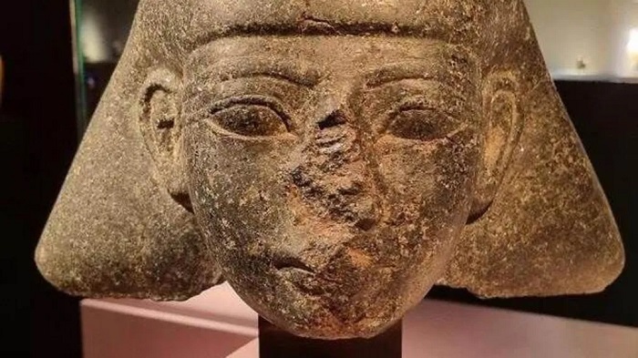 The stone head of an Egyptian official turned up at a Dutch art fair in 2022