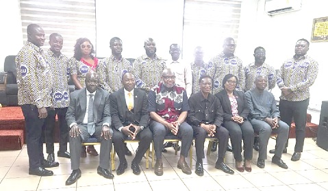 Morgan Ayawine (seated 3rd from right), General Secretary of ICU, with the newly inducted members of the National Consultative Council of COCOBOD Local Union