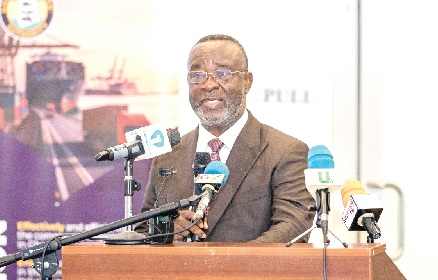 Justice Paul Baffoe-Bonnie (inset), Acting Chief Justice, addressing participants in the seminar