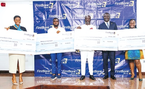 Representatives of the NGOs displaying their dummy cheques