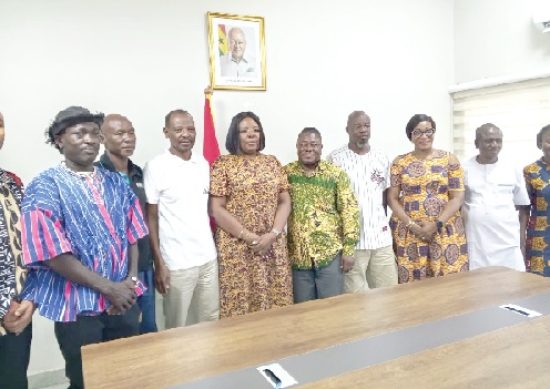 •  Mrs Wilhelmina Asamoah (4th from left) with officials of the Ghana Cycling Federation after the meeting