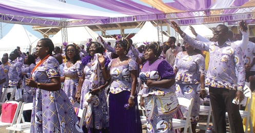 Some members of the congregation singing joyfully during the service