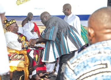 Togbi Sri III, the Awomefia, exchanging pleasantries with Julius Debrah, Chief of Staff, at the durbar, while Johnson Asiedu Nketiah, Chairman of National Democratic Congress, looks on.   Picture: DOUGLAS ANANE-FRIMPONG