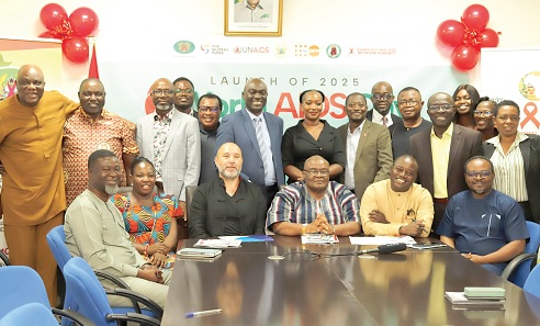 Dr Kharmacelle Prosper Akanbong (2nd from right), Acting Director-General, Ghana AIDS Commission; Kakra Essamuah (3rd from right ), Board Chair of the Ghana AIDS Commission, and participants in the launch. Picture: EDNA SALVO KOTEY