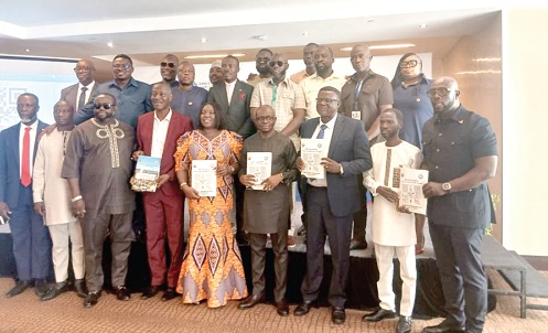 Rita Odoley Sowah (5th from left), Deputy Minister of Local Government, Chieftaincy and Religious Affairs; Dr Kwadwo Yeboah (3rd from right), Chief Executive Officer of LUSPA, with MMDCEs in the Greater Accra Region and other officials of LUSPA during the launch of the manuals