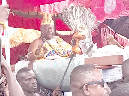 Nene Sakite ll, Konor of the Manya Krobo Traditional Area, being carried in a palanquin during the festival