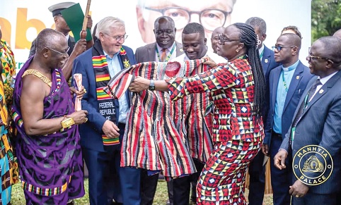 Prof. Rita Akosua Dickson (3rd from right) presenting a smock to Frank-Walter Steinmeier  (2nd from left), the German President, during his visit to the KNUST in Kumasi. Those with them are Akyamfuor Asafo Boakye Agyemang Bonsu (in Kente), the Asafohene; Frank Amoakohene (middle), Ashanti Regional Minister, and Prof. David Asamoah (right), Pro VC, KNUST. Picture: EMMANUEL BAAH