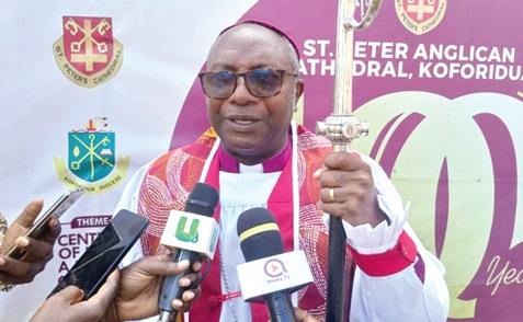 Rt Rev. Felix Odei Annancy (inset), Bishop of the Koforidua Diocese of the Anglican Church, addressing church members at its centenary celebration in Koforidua