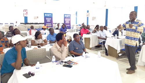 Michael Kwame Boadi (right), Fundraising Manager at TI-Ghana, speaking during the training of the Ahafo participants 