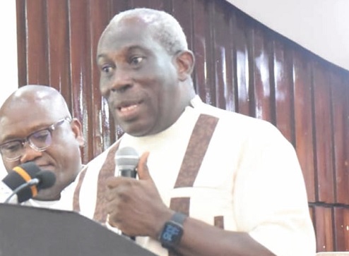 Professor Eric Desmond Kotei Addison (right), Board Chairman, Allied Health Professions Council, swearing in the graduates