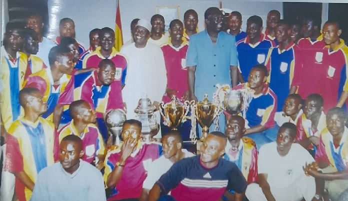 Flashback: 2000 Africa champions Accra Hearts of Oak in a historic picture with President J.A. Kufuor and Veep Alhaji Aliu Mahama at the State House after presenting the CAF Champions League Cup and the Super Cup the club won in 2000
