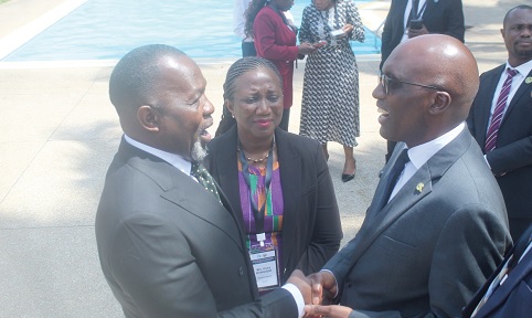Dominic Akuritinga Ayine (left), Attorney-General  and Minister of Justice, exchanging pleasantries with Bemanya Twebaze (right), Director-General, ARIPO.  With them is Grace Issahaque (2nd from left), Registrar-General. Picture: ESTHER ADJORKOR ADJEI