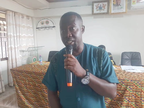 Emmanuel Kwame Frimpong (right), Tano South Municipal Chief Executive, addressing the meeting