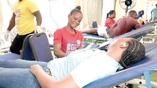 A member of the Ever Fruitful Church going through the process of donating blood