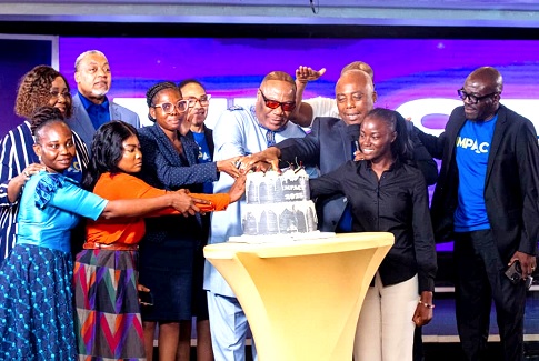 Archbishop Nicholas Duncan-Williams (middle) — Founder, Action Chapel International, joined by leadership of the church and some media practitioners to cut the Impact 2025 cake after the launch