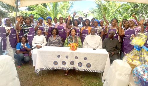 Rebecca Akufo-Addo (seated middle) with some reverend ministers and beneficiaries of the skills training 