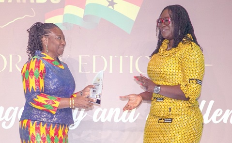 Doreen Hammond (left), Editor, The Mirror, receiving the Print Tourism Media of the Year Award. Picture: DOUGLAS ANANE-FRIMPONG