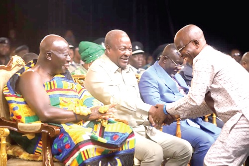 The writer (right) sharing pleasantries with President  John Mahama and the Asantehene, Otumfuo Osei Tutu at the GJA awards at Manhyia